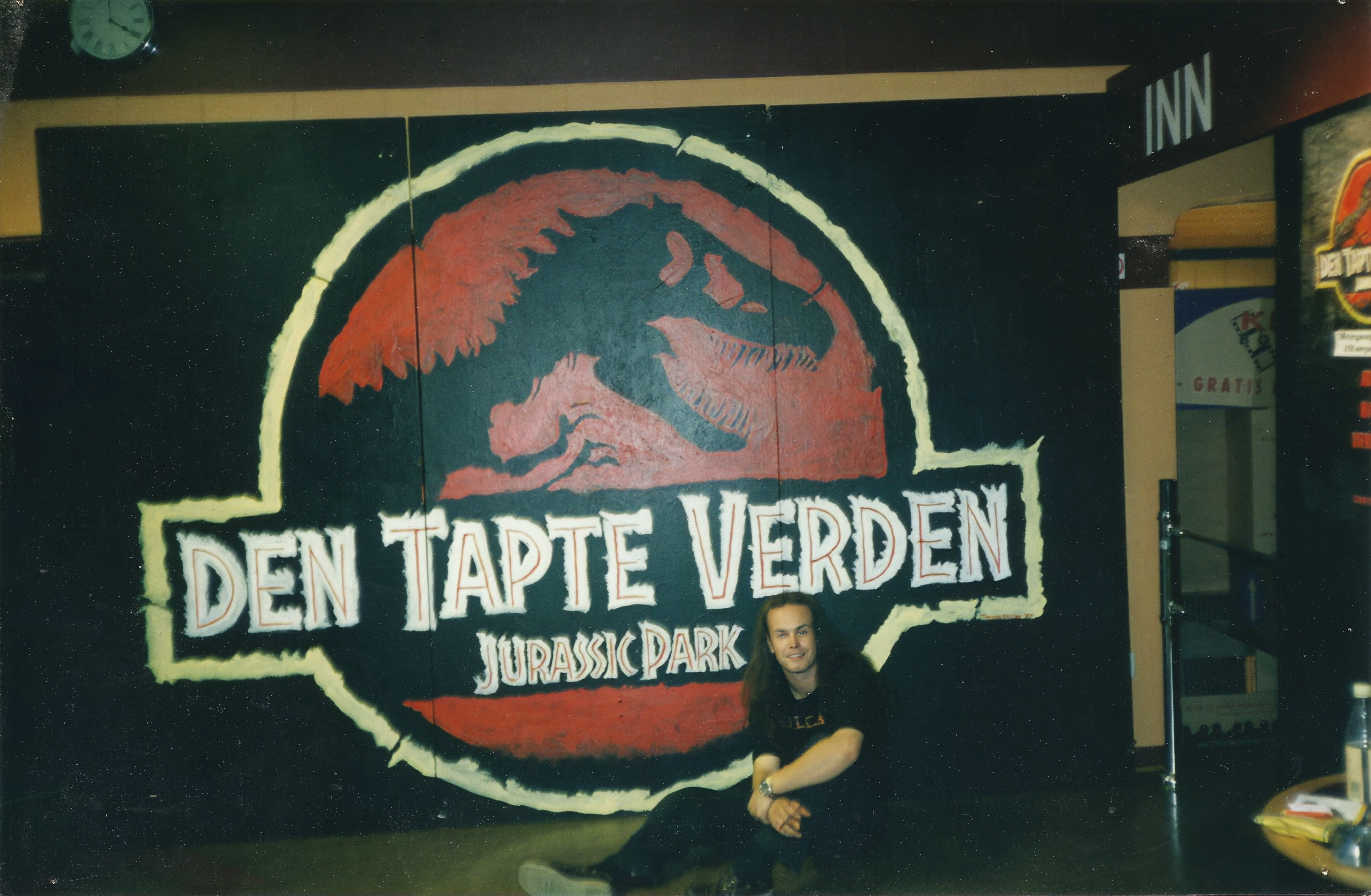 Torgrim in 1997, beside a hand-painted cinema billboard for The Lost World: Jurassic Park