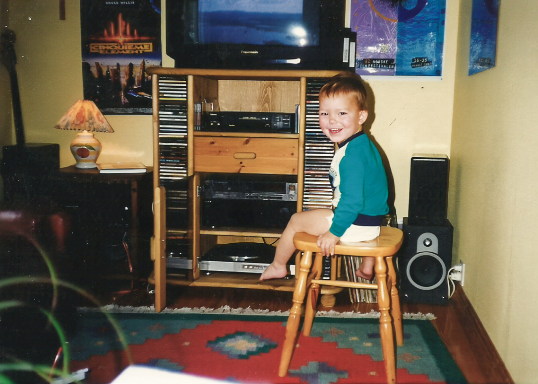 A 2-year old Mathias enjoying a listening experience in 1997